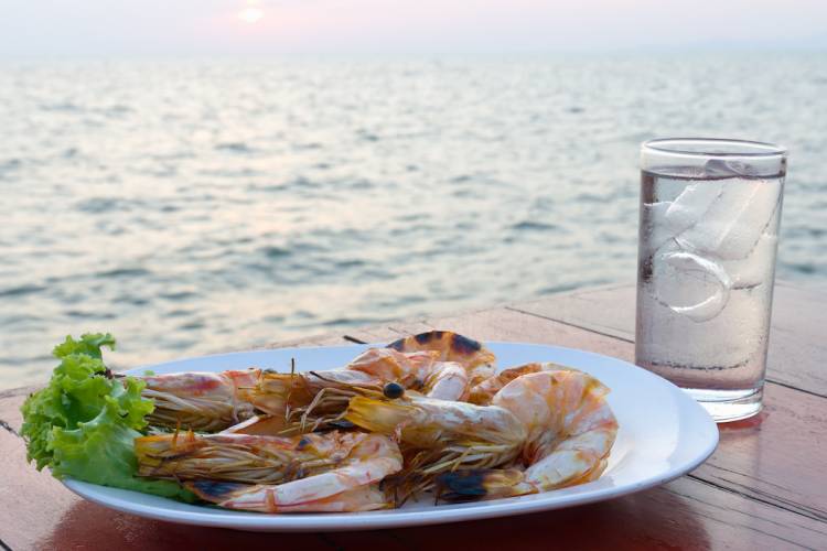 shrimp dinner at a waterfront table
