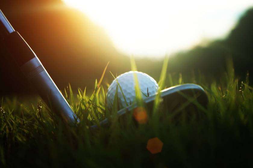 close up of golf ball on tee