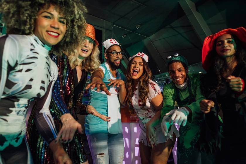 adults at a halloween costume party