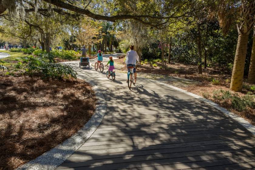 family riding bikes in hilton head